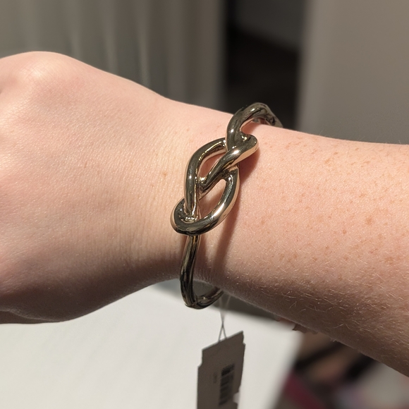 Goldtone Knot Bangle Bracelet - Picture 6 of 6